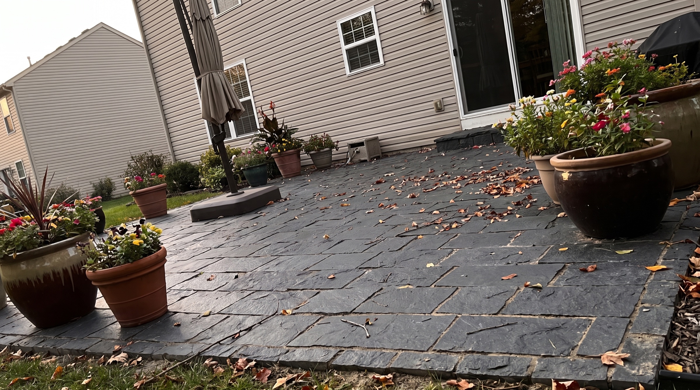 Dark splitface granite pavers on a terrace